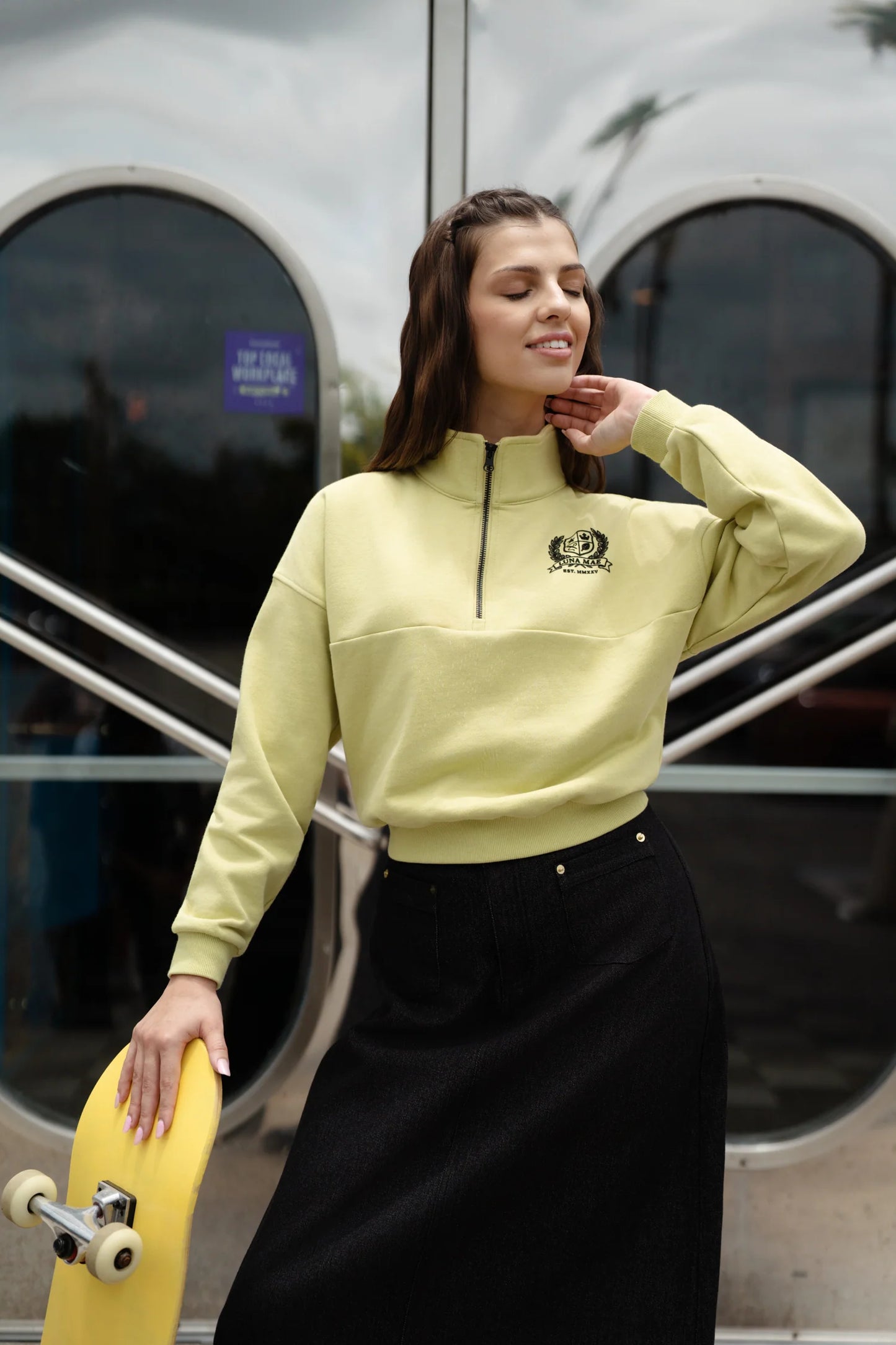 Yara half zip emblem lime sweatshirt FW26