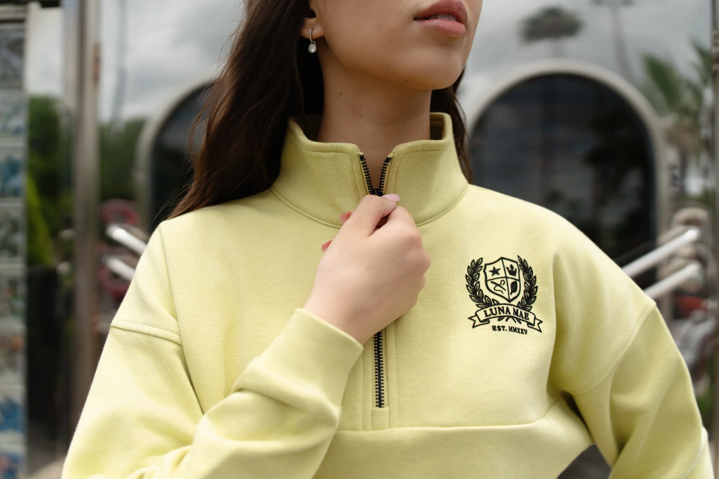 Yara half zip emblem lime sweatshirt FW26